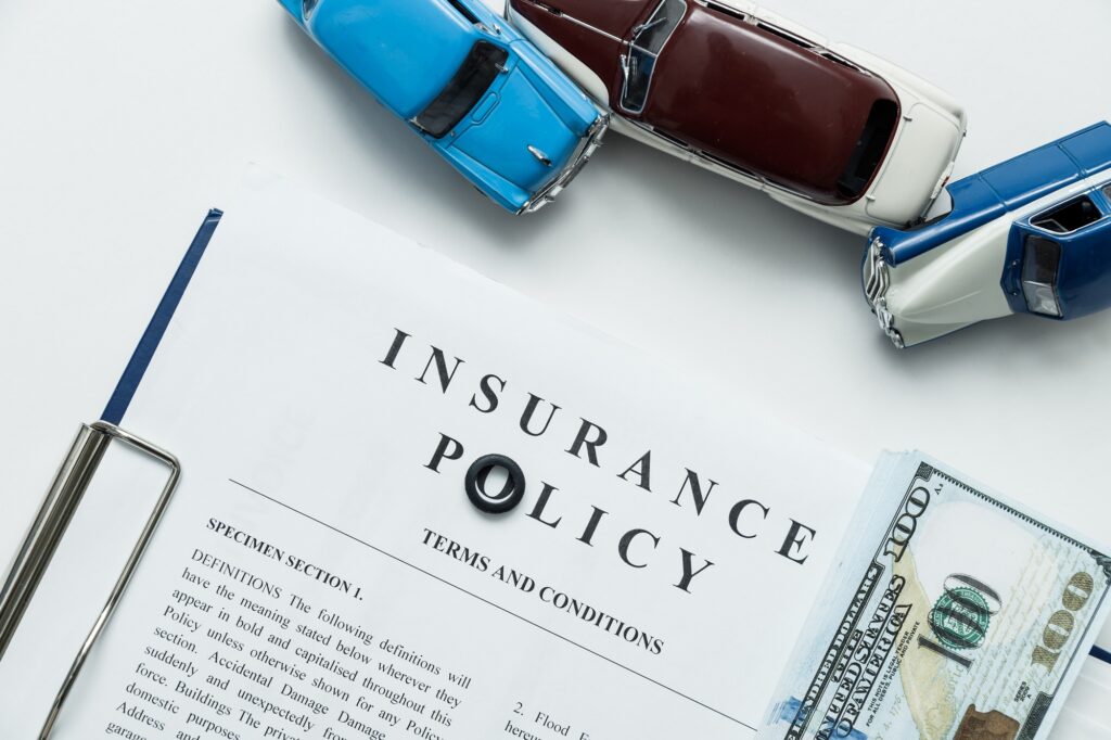 three cars and insurance policy. How to Save Money on Your Insurance Policy